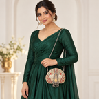 DEVIQ Surkh Shankh shell clutch — model wearing chain sling