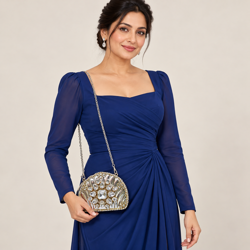 DEVIQ Chandrika shell clutch — model wearing chain sling