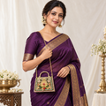 DEVIQ Rajsi Ratna hard purse clutch — model with chain sling